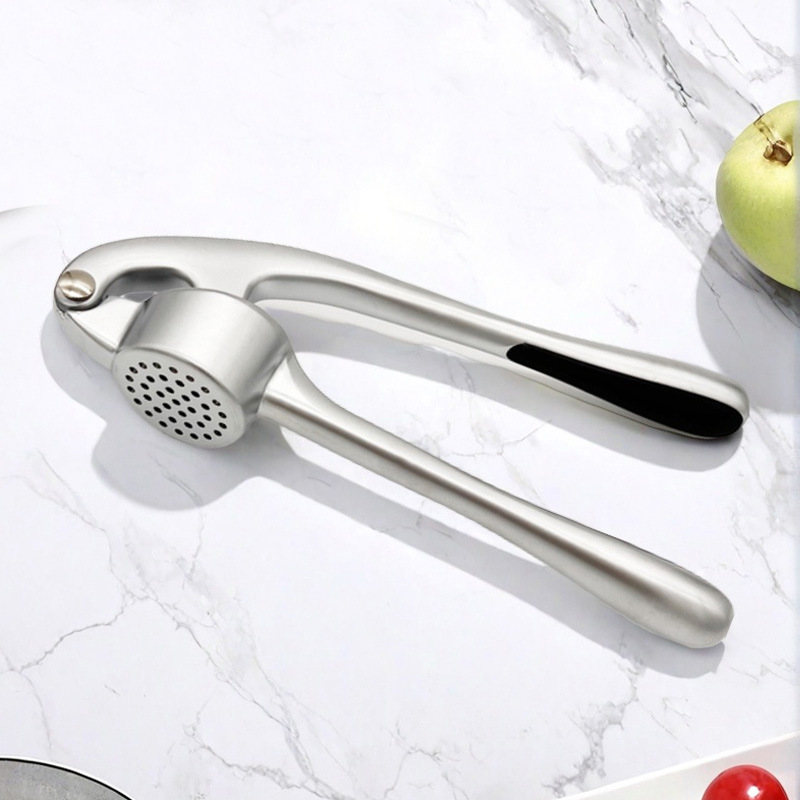 Presse-ail manuelle - un écras - Kitchen Gadgets Made In Usa avis et prix